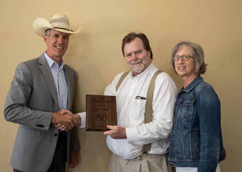 Dr. Bob Hough (center), Lone Tree, Colorado, receives the Beef Improvement Federation Pioneer from Matt Perrier, 2022 BIF president. Also pictured is Bob’s wife, Nancy. Hough was honored June 3 at the organization’s 54th Annual Symposium and Convention in Las Cruces, New Mexico.