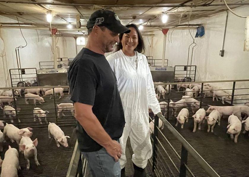 Liane Hart, Verility CEO, works with a manager at a pork farm in central Indiana. Verility has closed a $3.5 million Series A round of funding, which will help the company prepare to commercialize its livestock fertility analysis platform. 