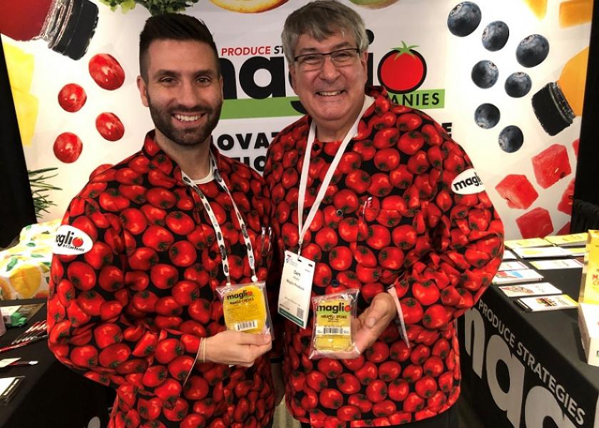 Paul Maglio, director of operations , with the Maglio Companies, Glendale, Wis., and Sam Maglio, CEO, display the firm’s Mango Cheeks and Pineapple Spears at the IFPA Foodservice Conference Expo on July 29.