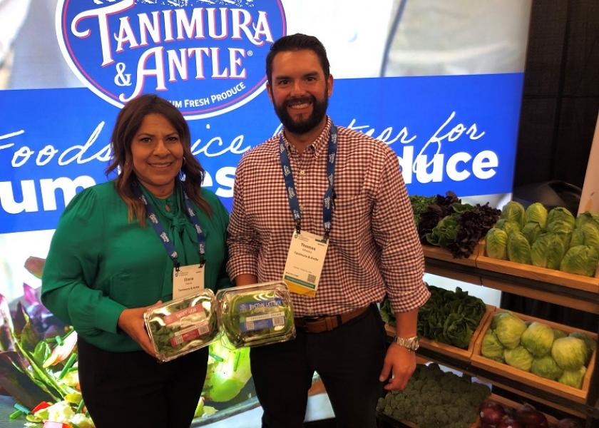 Diana Garcia, replenishment analyst at Tanimura & Antle, Salinas, Calif., and Thomas Wheelus, director of foodservice, display the company’s greenhouse-grown Sweet Gem and Boston Lettuce at the International Fresh Produce Association’s Foodservice Conference.