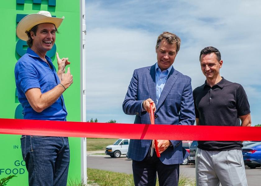 Square Roots co-Founder and Chairman Kimbal Musk (left), Gordon Food Service Regional General Manager Hans Hansen (center), and Square Roots co-Founder and CEO Tobias Peggs (right) celebrate the new Square Roots indoor farm in Kenosha, Wis.