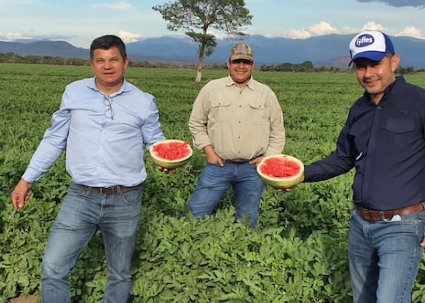 Fyffes employees share Honduran melon harvest. 
