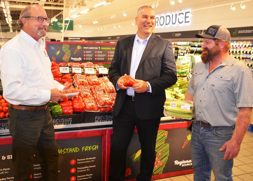 New Jersey Agriculture Secretary Douglas Fisher (from left), Stop & Shop Vice President of Produce Brian Fleming and Farmer Jimmy Abma, who owns and operates Abma’s Farm in Bergen County, celebrate the local produce that's at Stop & Shop's stores.