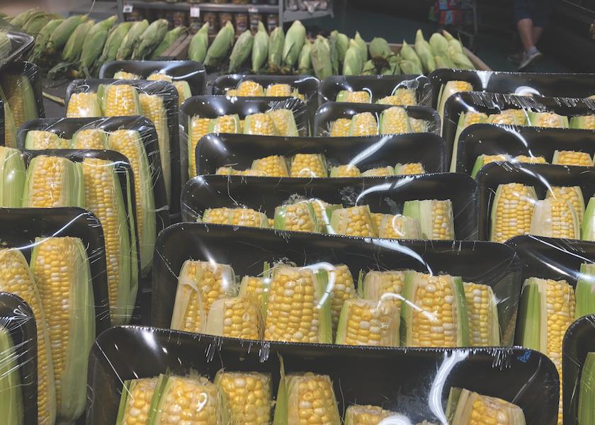 Sweet corn, such as this item at Stop & Shop in New York, with the ends cut off, partially shucked, and in over-wrapped trays can get a much higher price than bulk corn.