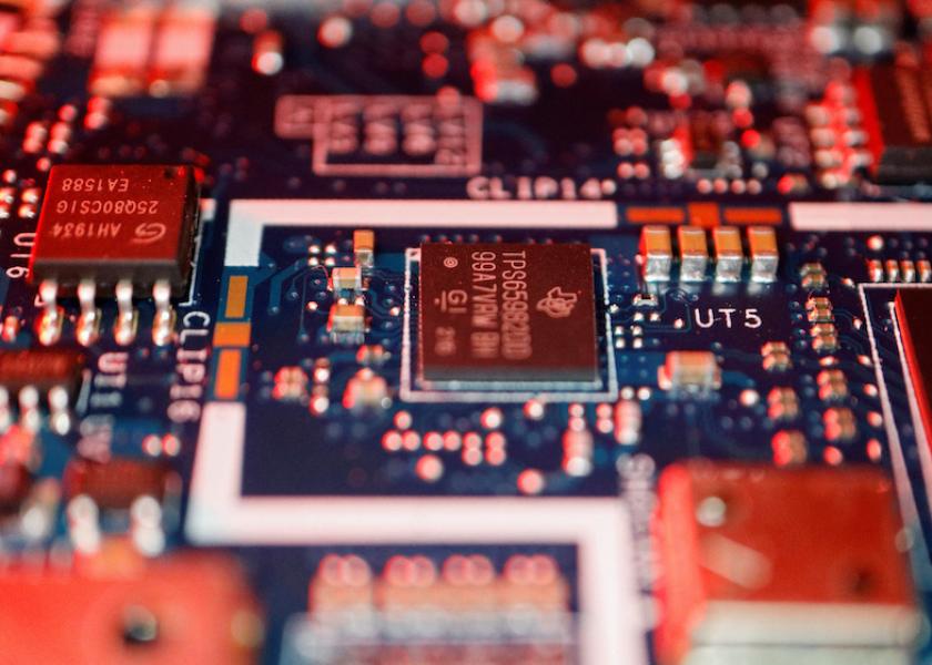 FILE PHOTO: Semiconductor chips are seen on a circuit board of a computer in this illustration picture taken February 25, 2022. 