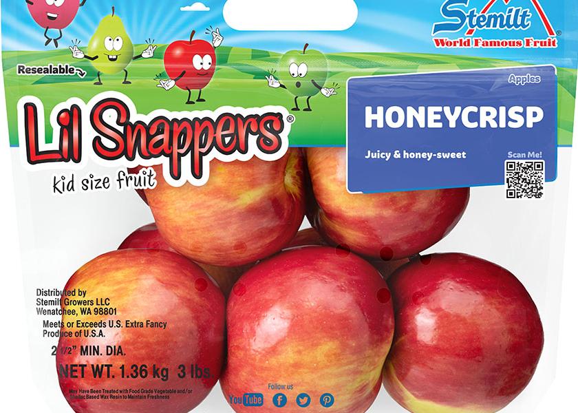 Stemilt Lil Snappers line of apples and pears fit in small hands.