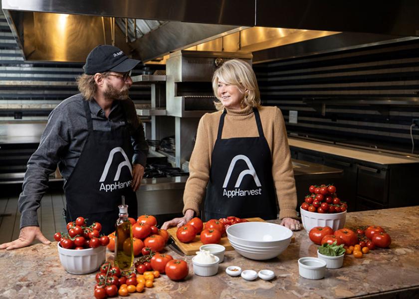 AppHarvest board member Martha Stewart and CEO Jonathan Webb cook using fresh AppHarvest tomatoes grown in the company's 60-acre farm in Moreland, Ky.