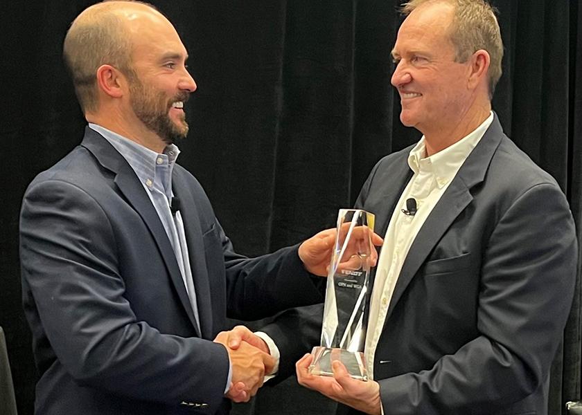  Jeff Huckaby (right) received the Grower of the Year award at the Organic Grower Summit in Monterey, Calif., presented by the Organic Grower Network.
