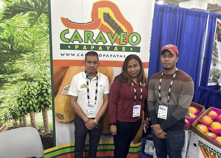 From left: Rosalino Flores, Nancy Mendez and Roselio Calletano talked about Caraveo Papayas Inc. at the Dec. 1, 2022, New York Produce Show.