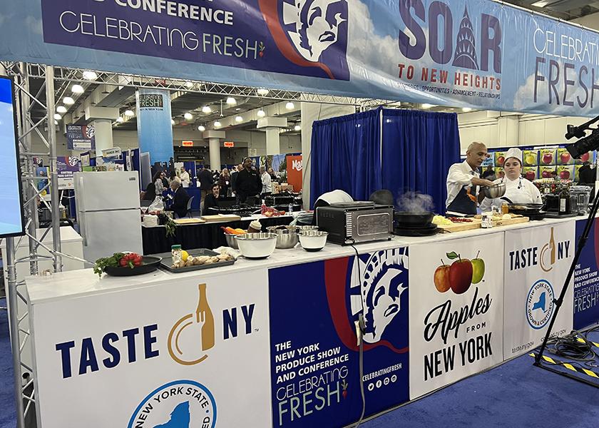 The New York Produce Show featured live cooking demonstrations on the show floor. Jehangir Mehta, executive chef of two New York City restaurants — Graffiti Earth and Me and You — is shown preparing inventive produce-based dishes.
