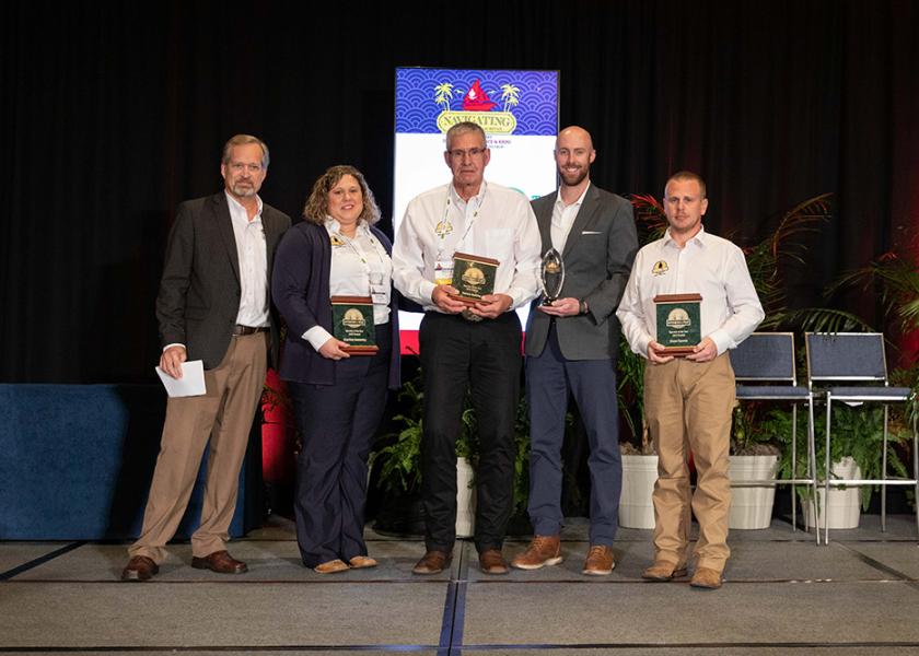 Patrick Hoefling (center) of Nutrien Ag Solutions and Odebolt, IA was named the 2022 recipient. 