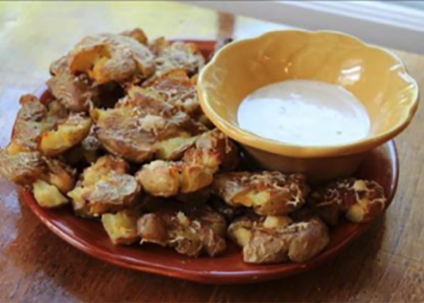 A Side Delights recipe for Parmesan Smashed Potatoes With Roasted Garlic Aioli