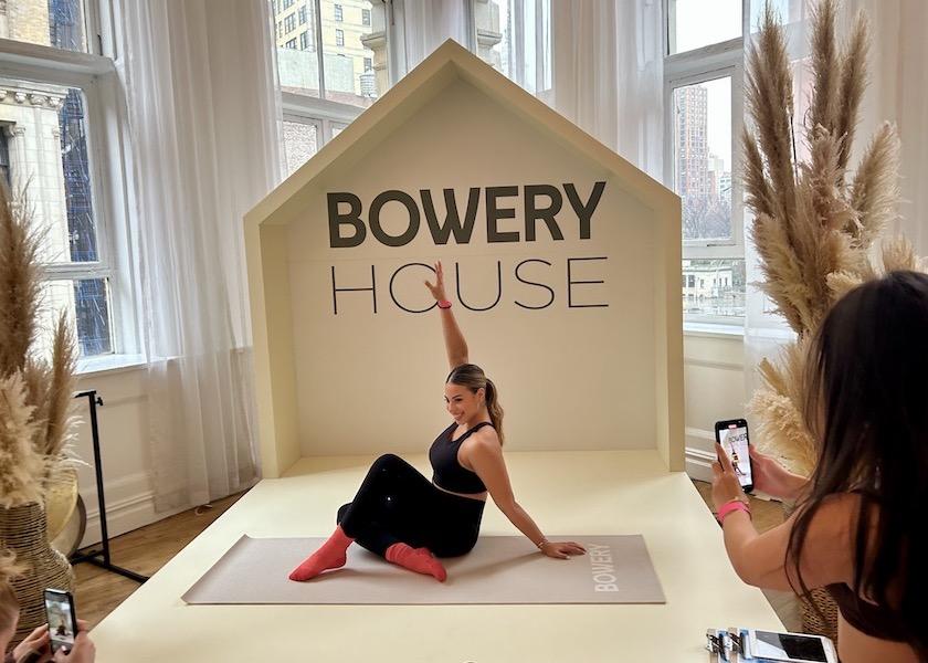 Raven Garcia, a social media influencer who values a healthy lifestyle and empowering women, poses for photos for possible posts while she attends Bowery House, an interactive spa-like event hosted in New York City by Bowery Farming, an urban indoor vertical farming company.