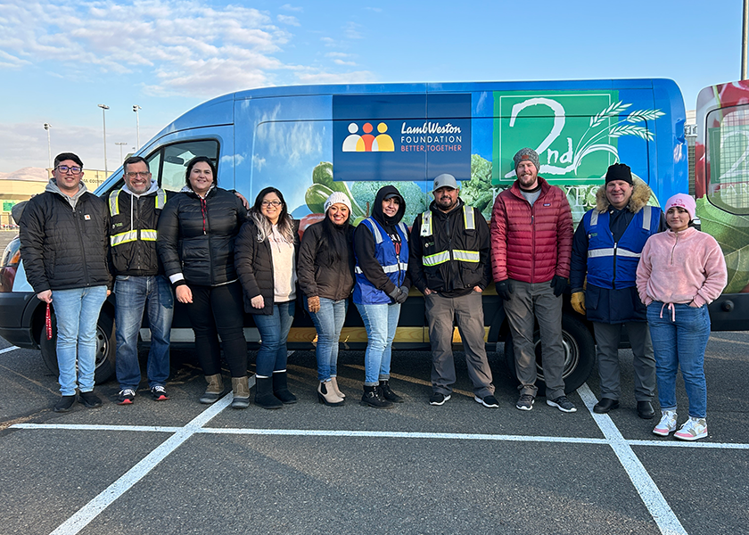 Superfresh Growers employees are shown at a 2nd Harvest turkey drive in 2022.