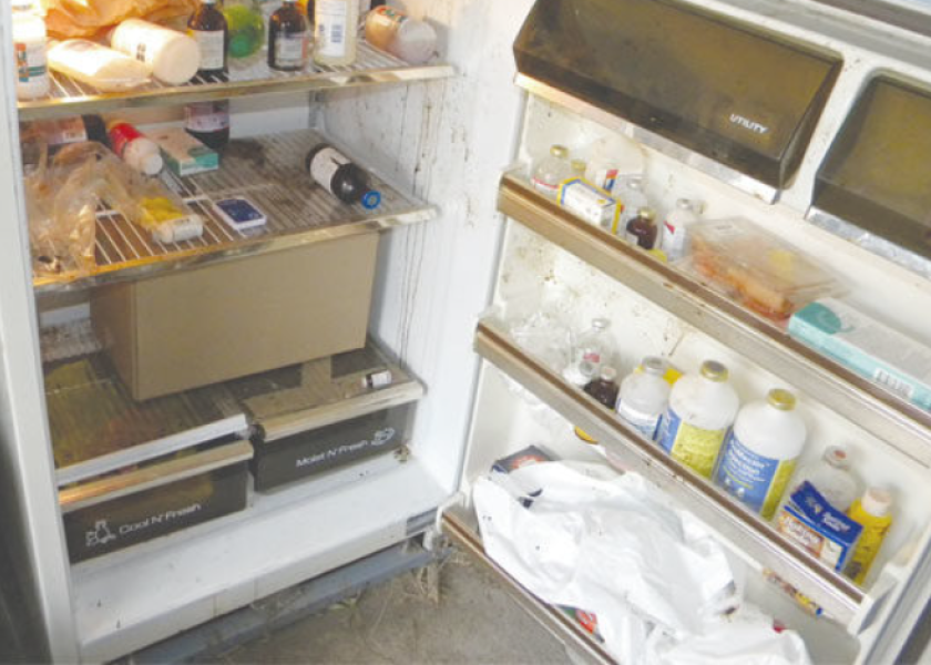 Animal health products stored in a refrigerator.