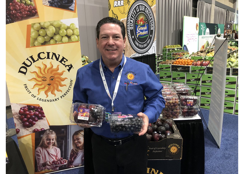 Howard Nager, director of marketing and business development for Los Angeles-based Pacific Trellis Fruit and its Dulcinea brand, displays the firm’s Extra Sweet Plums and Jam Grapes at the 2023 AWG Innovation Showcase, March 20-22 in Overland Park, Kan.