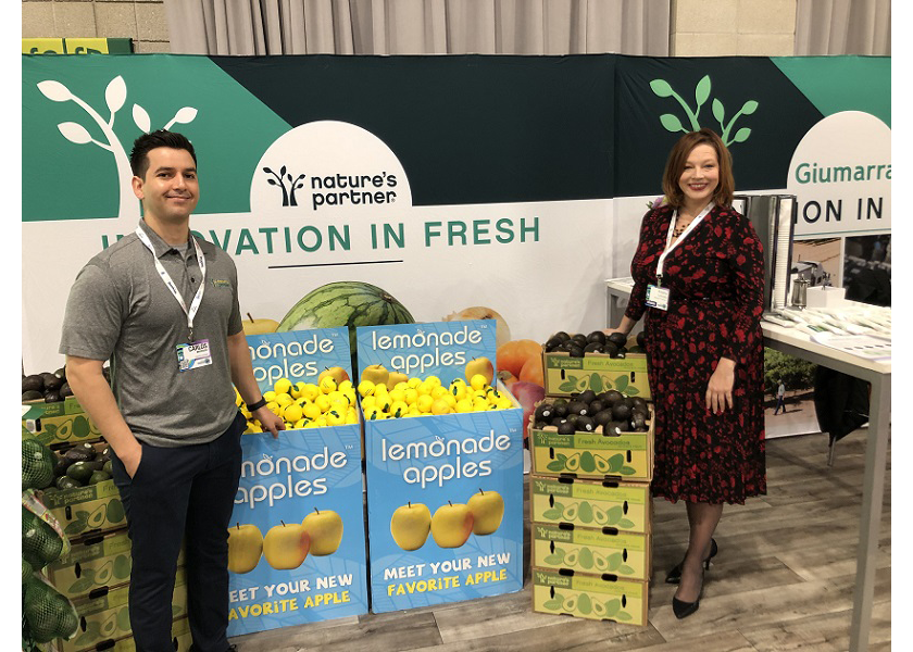 Carlos Marquez, sales account manager for Giumarra, Ventura, Calif., and Kristina Lorusso, business development manager for Giumarra, Los Angeles, attended the Associated Wholesale Grocers Innovation Showcase in Overland Park, Kan. Although the variety was sold out at the time of the show, Giumarra showed its POS merchandising bins for the proprietary Lemonade apple variety.