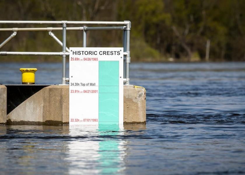 A marker on Lock and Dam 11 shows the water level from the Mississippi River as it flows out of its banks during a river flood warning, Wednesday, April 26, 2023, in Dubuque, Iowa.