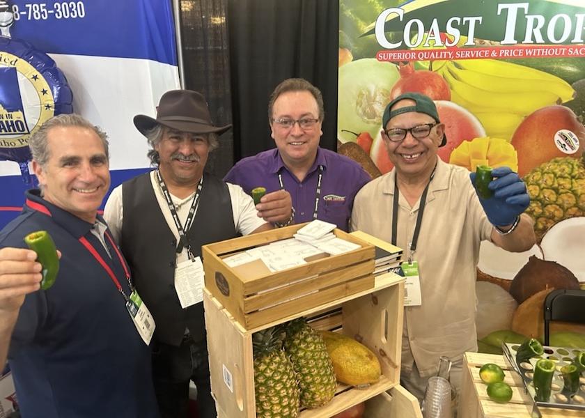 Bruce Gitmed of Bruce's Produce, as well as Fernando Morales, Bill Sunderland and George Nunez, all of Olympic Fruit and Vegetable with the Coast Tropical label, enjoy chatting and sipping tequila with fresh lime inside fresh jalapeño pepper shooters at the 10th anniversary West Coast Produce Expo May 18-20 in Palm Desert, Calif.