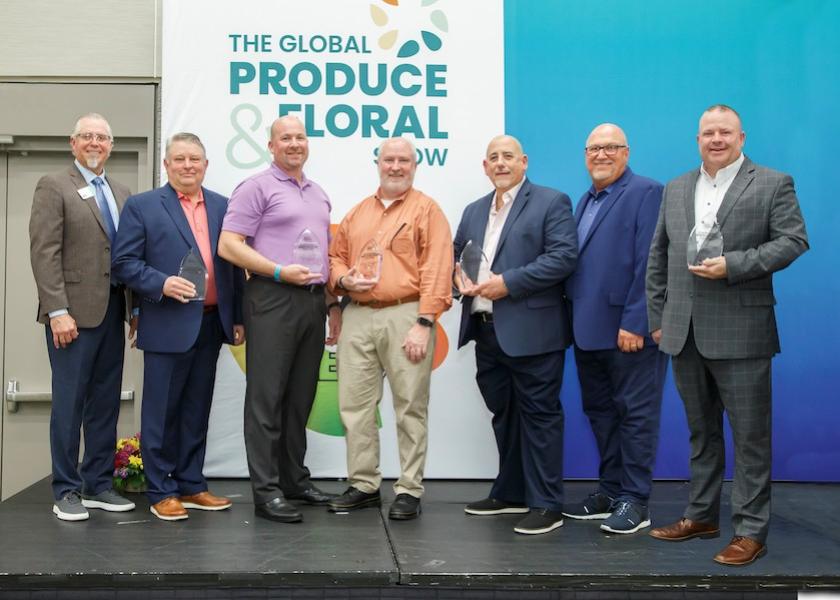 The 2022 winners of the IFPA Retail Merchant Innovation Awards represent the best of the best in produce retailing. Showm from left are IFPA’s Joe Watson, Barry Paul of Shaw’s Supermarkets, Jim Gaylord of Wegman’s Food Markets, Brian Penfield of Sendik’s, Vic Savanello of Spartan-Nash, Chuck Sinks of Sage Fruit (award sponsor) and Jeff Mallory of Hy-Vee.