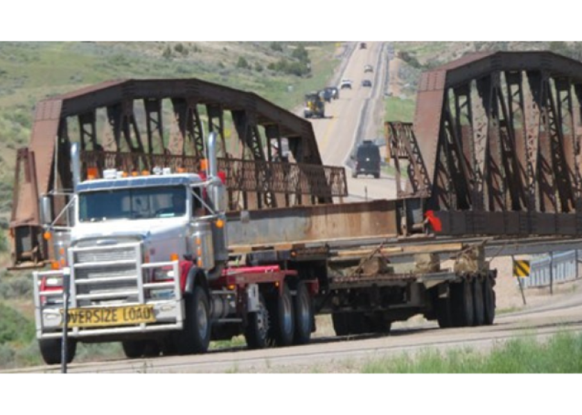 100-year-old bridge is moved along Highway 16 in Washakie County, Wyo.