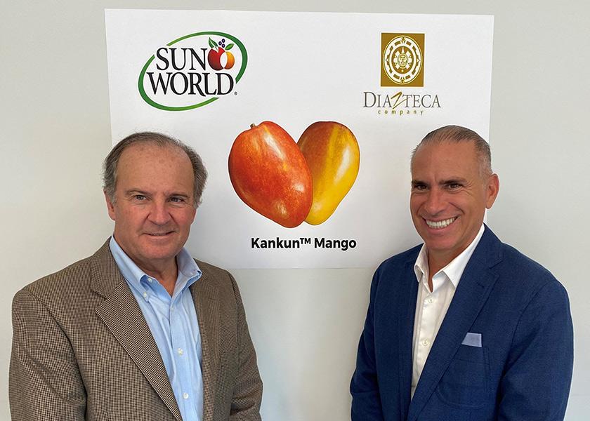 Shown from left are Sun World CEO David Marguleas and Diazteca Director General Ismael Diaz at the signing ceremony for the Kankun mango variety.