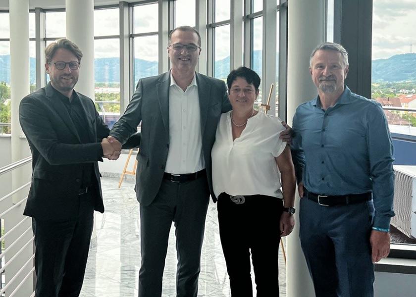 Bizerba executive board members meet with Fabbri Group CEO Stefano Pellegatta (second from left) in Balingen, Germany, for a contract signing.