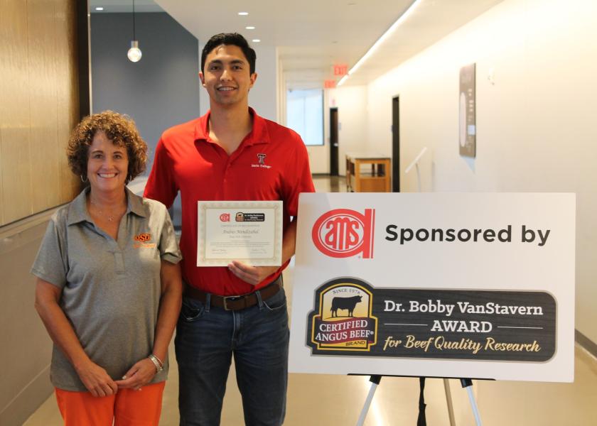 Gretchen Mafi, president of the American Meat Science Association, presented Andres Mendizabal the Dr. Bobby VanStavern Award during the Reciprocal Meats Conference.