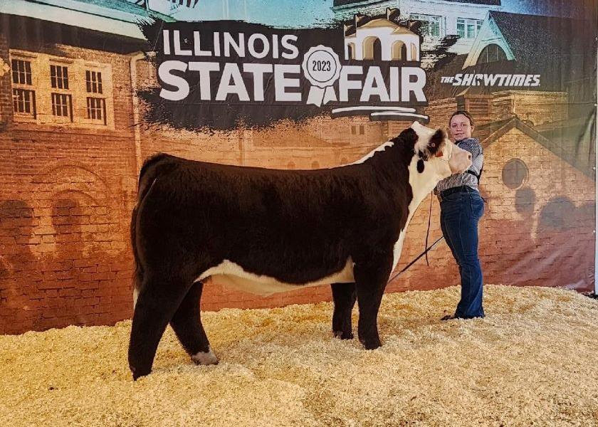 Maci Brooks with her Reserve Grand Champion Land of Lincoln and Champion Hereford Steer at the 2023 Illinois State Fair. 