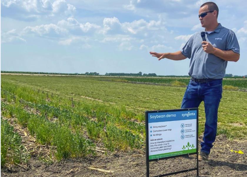 Brad Bernhard, Syngenta agronomic research scientist,  briefs visitors at one of the Syngenta regenerative agriculture field demos on the importance of ‘relay cropping’ with camelina so farmers can reap the benefits of this practice without delaying their regular planting timelines. 