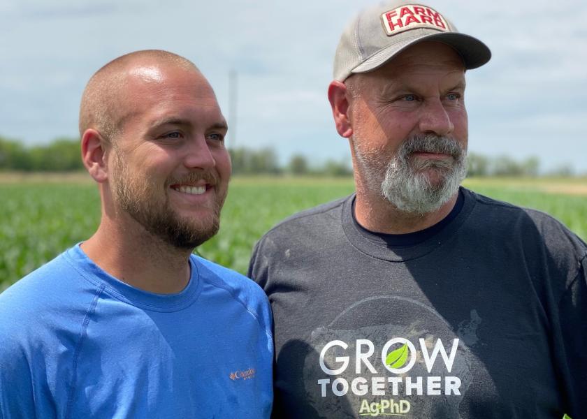 One million sweet corn ears given to the public later: “It was never about sweet corn. It was about how we see life,” says Matt Miles, right, alongside his son, Layne. 