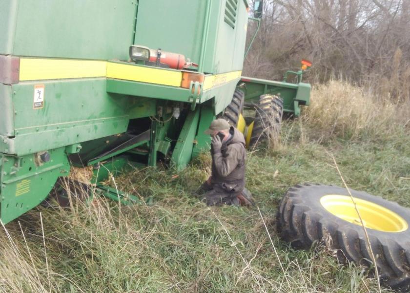 Caption This: A Mechanic Walks Up to a Broken-Down Combine …