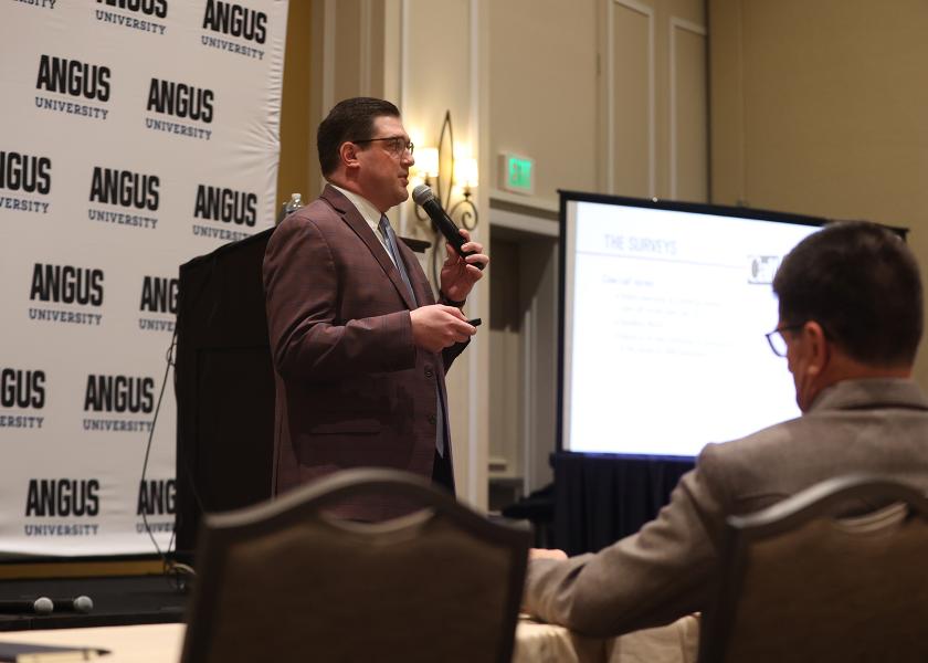 Clay Zwilling, Angus Media president shares the results of a beef industry study during Angus University at the Angus Convention in Orlando, Fla. 