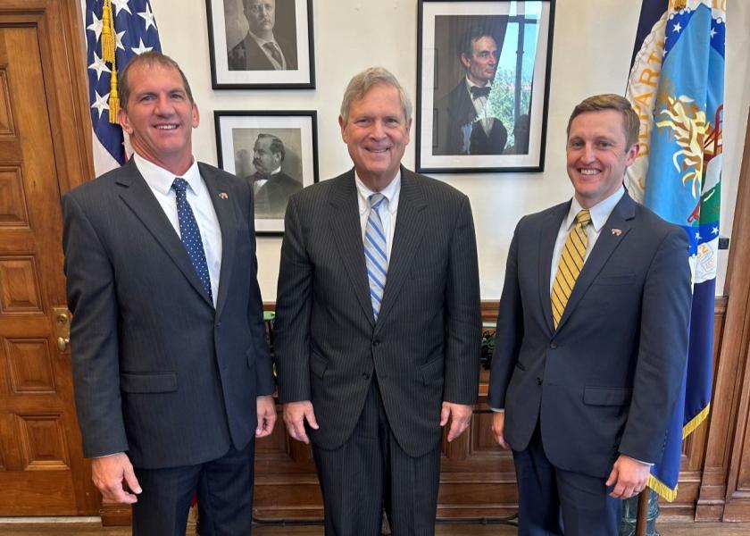 NPPC President and Missouri pork producer Scott Hays (left) and NPPC CEO Bryan Humphreys (right) met with United States Secretary of Agriculture Tom Vilsack (middle) to thank him for the recent Section 32 purchase of $50.1 million of pork for distribution to various food nutrition and assistant programs, as well as to discuss the status of the pork industry.