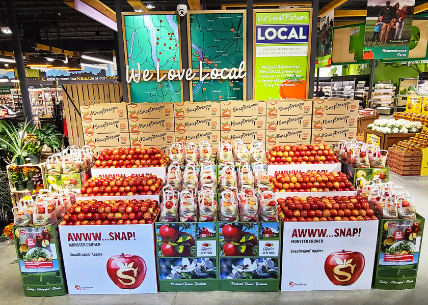 An easy way to sell apples is by putting them in totes placed in displays, which works for any season.