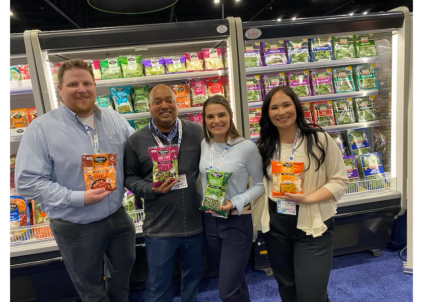 Taylor Farms Retail executives were highlighting several new products at the Associated Wholesale Grocers' seventh annual Innovation Showcase, March 25-26. Shown from left are Matthew Cole, retail commodity sales for Taylor Farms Retail, Salinas, Calif.; Ed Johnson, sales representative for the central region; Kellie Nino, retail sales; and Megan Smith, retail sales.