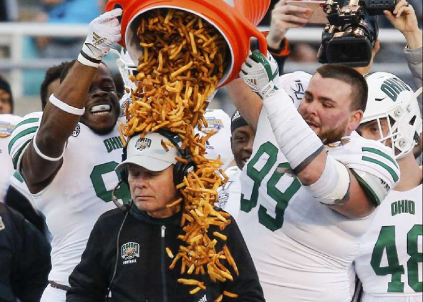 The Ohio Bobcats head coach Frank Solich was doused with french fries after winning the2019 Famous Idaho Potato Bowl. 


