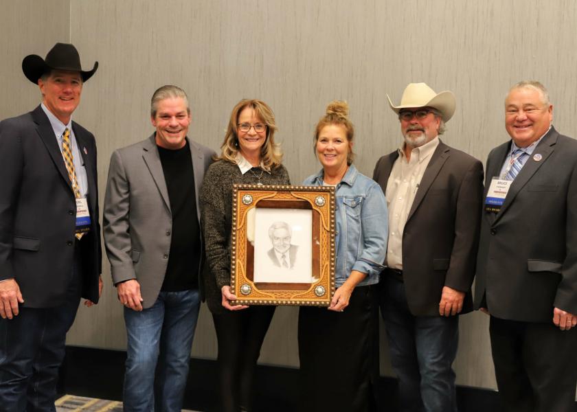 Pictured (l to r) are: 2020 American Hereford Association (AHA) President Joel Birdwell, Barry and Pam Healey, Janet and Brian Healey and AHA Board director Bruce Everhart.
