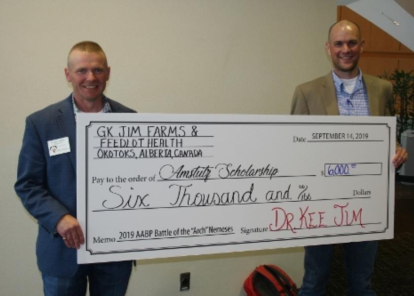 Drs. Eric Behlke (left) and Holt Tripp competed in the 5-K run, motivated by a $6,000 donation to the Amstutz Scholarship from Feedlot Health founder Dr. Kee Jim.