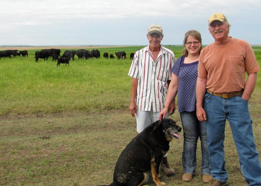 Terry, left, DenaMarie and Wayne Springer are pushing toward open-pollinating corn and direct-to-consumer beef.