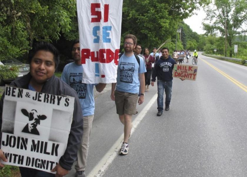 Scores of dairy farm workers and activists marching in Montpelier, Vt., on Saturday June, 17, 2017.