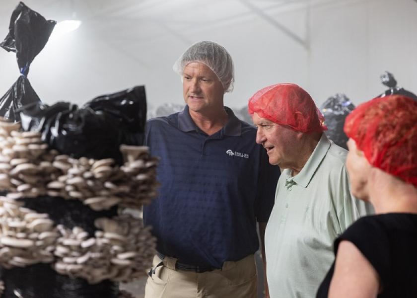 Pete Gray (from left), grower manager at Phillips Mushroom Farms, Kennett Square, Pa., takes Agriculture Secretary Sonny Perdue and U.S. Rep. Chrissy Houlahan (D-Pa.), on a tour of the companies facilities on May 30. 

