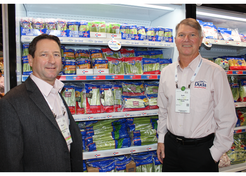 Mark Bassetti (left), senior vice president of sales and marketing, and Sam Duda, senior vice president of national operations, told booth visitors how Oviedo, Fla.-based Duda Farm Fresh Foods has expanded its cooling and fresh-cut facility in Oxnard, Calif.